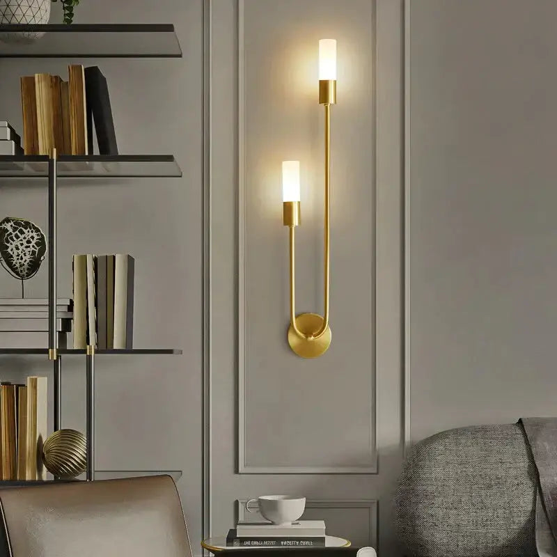 Modern gold minimalist led wall lamp with two frosted glass shades and curved metal arm for bedroom vertical wall sconce