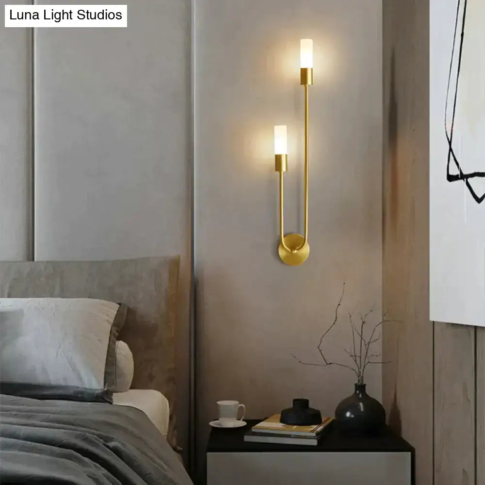 Modern gold minimalist led wall lamp with two vertical cylindrical lights for bedroom use