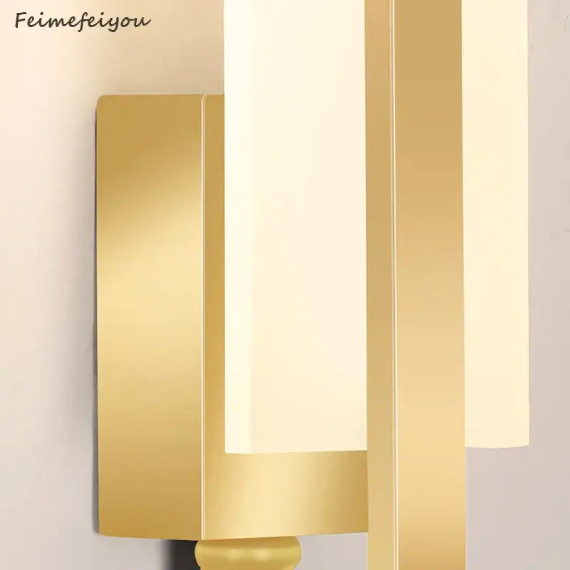 Modern gold minimalist led wall lamp with sleek vertical bars and frosted glass panels for bedroom aisle lighting