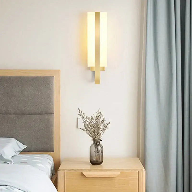 Modern gold minimalist led wall lamp with a sleek rectangular design for bedroom aisle lighting