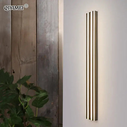 Modern gold minimalist led wall lamp with three vertical warm light strips for bedroom and exterior corridor decorbites led wall