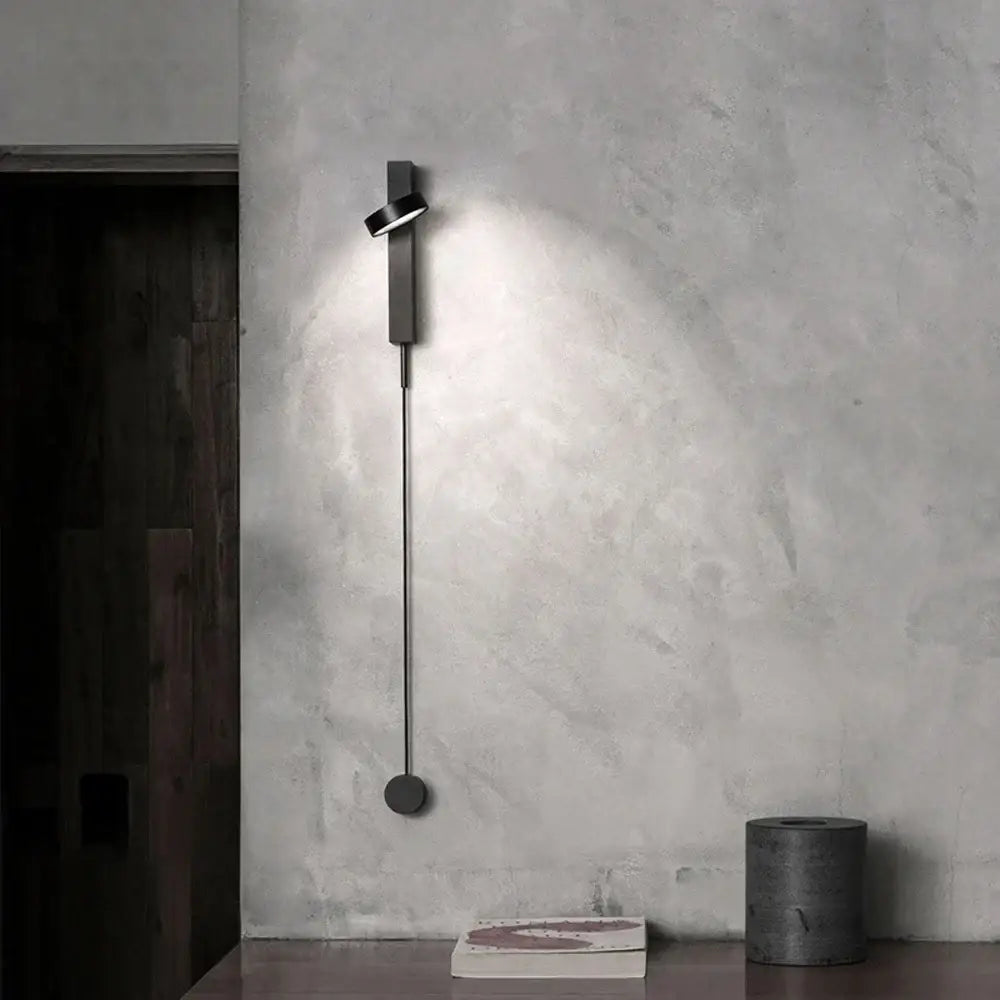 Modern black minimalist led wall lamp with sleek elongated design and adjustable light head for living room art lighting