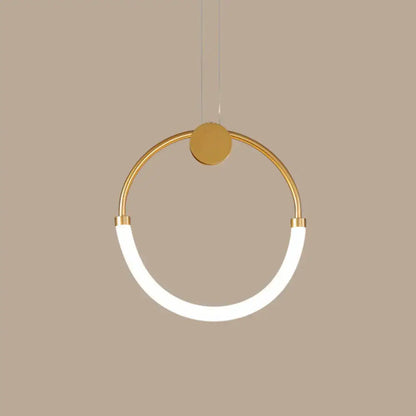A modern gold minimalistic ring pendant light with a sleek circular frame and white curved led strip for living room