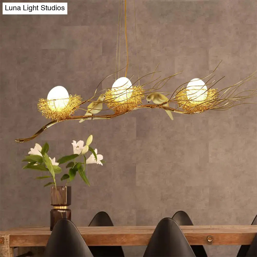 Decorbites modern gold nest island pendant chandelier with three egg-shaped bulbs in woven nests and bird decor