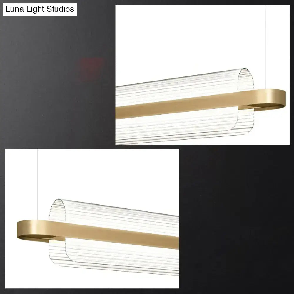 Modern minimalist nordic linear island lamp with translucent ribbed glass and gold metal accents for dining room lighting