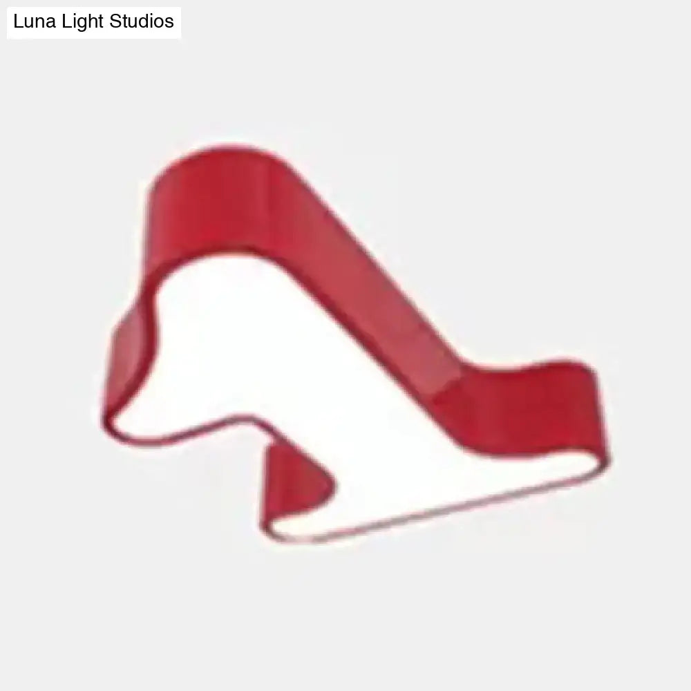 Red high-heeled shoe-shaped cookie cutter displayed with DecorBites™ modern LED flush mount light for ceiling
