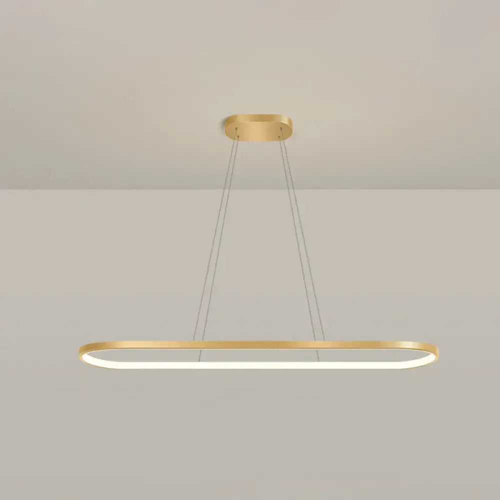 Modern gold oblong pendant light fixture with integrated led lighting and adjustable chain cord length for dining room use