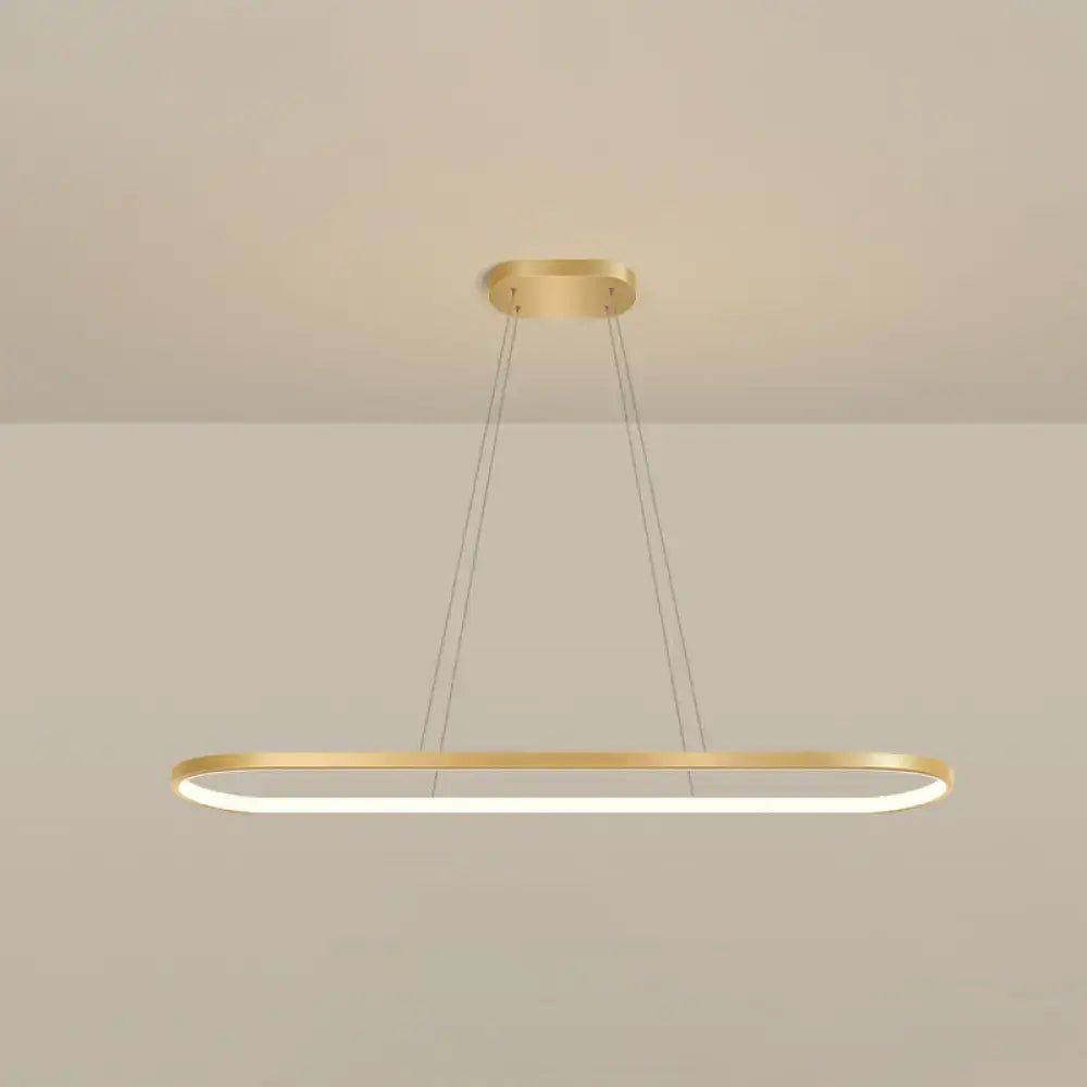 Modern gold pendant light fixture with oval oblong design, chain cord length, integrated led, warm white color for dining room