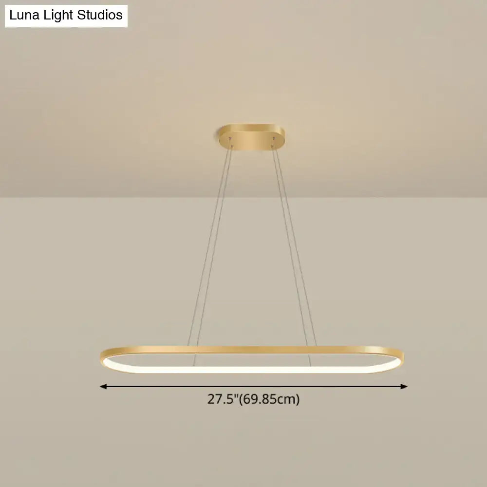 Modern gold oblong pendant light fixture with integrated led warm white color and adjustable chain cord length for dining room
