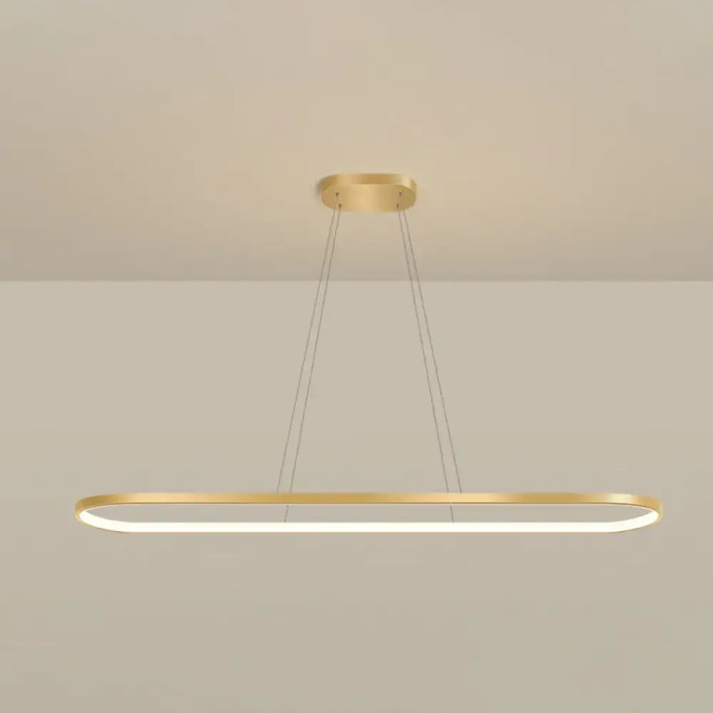Modern gold oblong pendant light fixture with integrated led warm white color and adjustable chain cord length for dining room