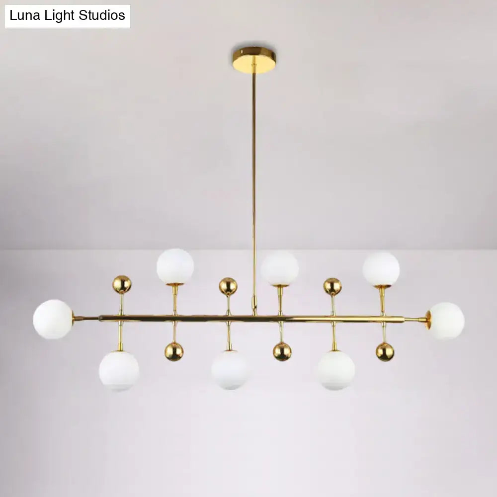 Decorbites modern gold hotel linear chandelier ceiling pendant with seven opal glass globe shades fixture width design