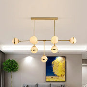 Modern DecorBites™ orb chandelier with six frosted glass globes and silver gold finish bulb base for hotel lighting