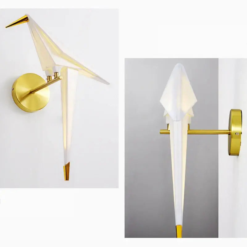 Modern gold origami bird led wall lamp with gold-toned metallic finish and translucent white paper-like wings for bedroom