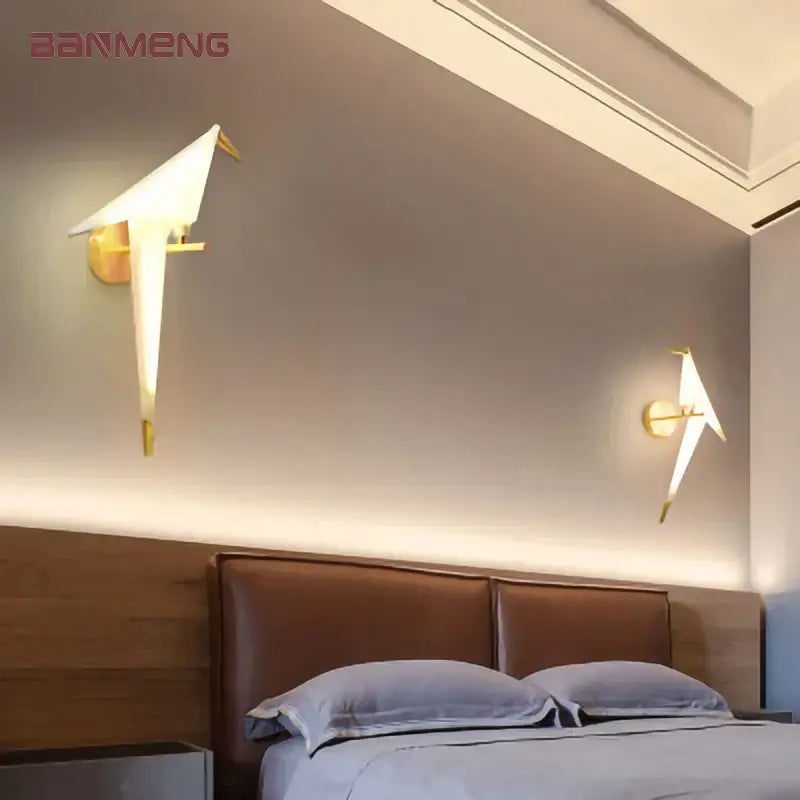 Modern gold origami bird led wall lamp with sleek minimalist design in gold-toned metal for bedroom wall lamp lighting