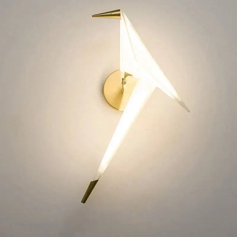 Modern gold origami bird led wall lamp with white translucent paper wings and pointed metallic tips for bedroom use