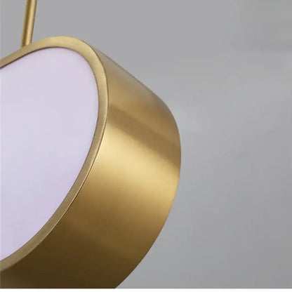 Modern gold oval decorbites led sunset chandelier featuring a gold-toned cylindrical pendant with diffused white light
