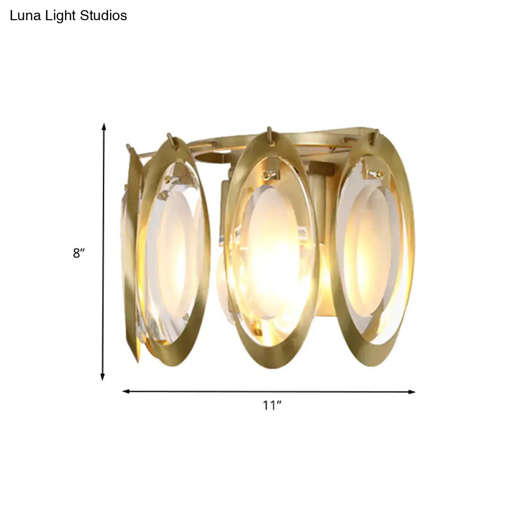 Modern gold oval sconce light with three glass panels and sleek design for living room wall fixture