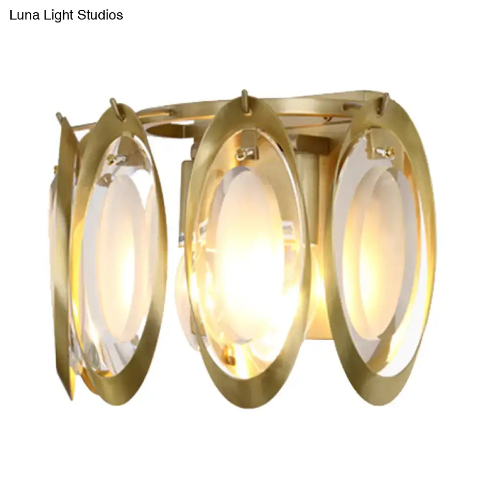 Modern gold oval sconce light with three glass panels featuring a sleek design for living room wall fixture