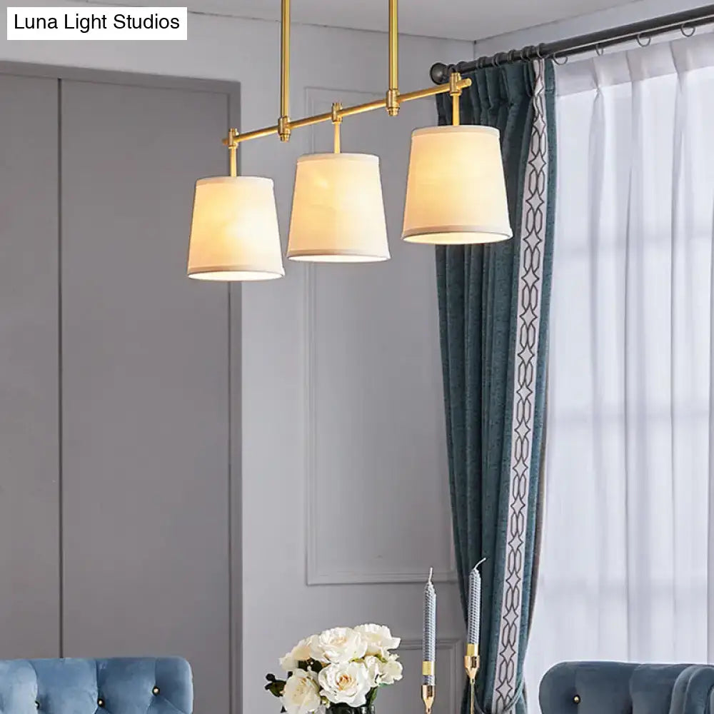 Decorbites modern gold pendant lamp with three off-white fabric shades perfect for dining room lighting