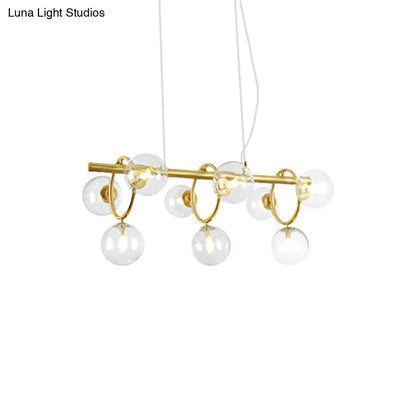 Decorbites™ nordic style gold pendant light with clear cognac glass spheres suspended by circular metal rings
