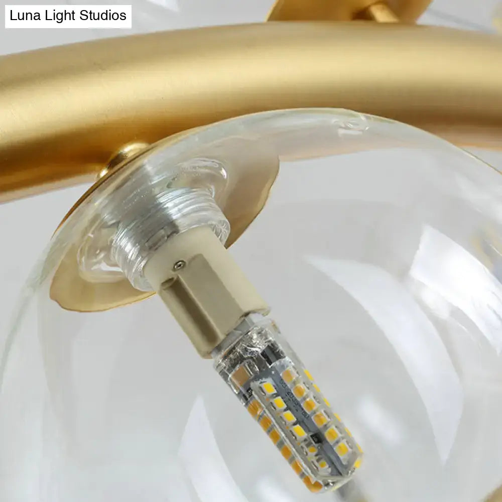 Gold-finished led bulb with visible yellowish leds in decorbites™ nordic style pendant light with clear cognac glass