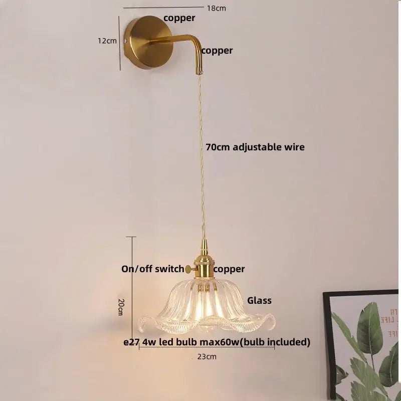 Modern gold petal led wall lights feature a brass finished sconce with fluted glass shade and adjustable copper wire decorbites led wall