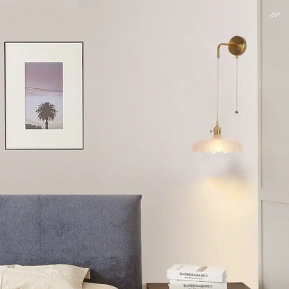 Modern gold petal led wall lights with brass finish, fluted glass shade, and adjustable pull-chain for bedroom decorbites led wall