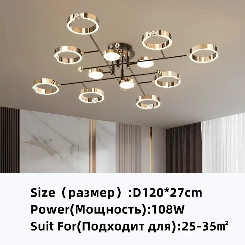 Modern gold plated chandelier with black arms featuring gold toned circular rings and embedded LED lights by decorbites gold
