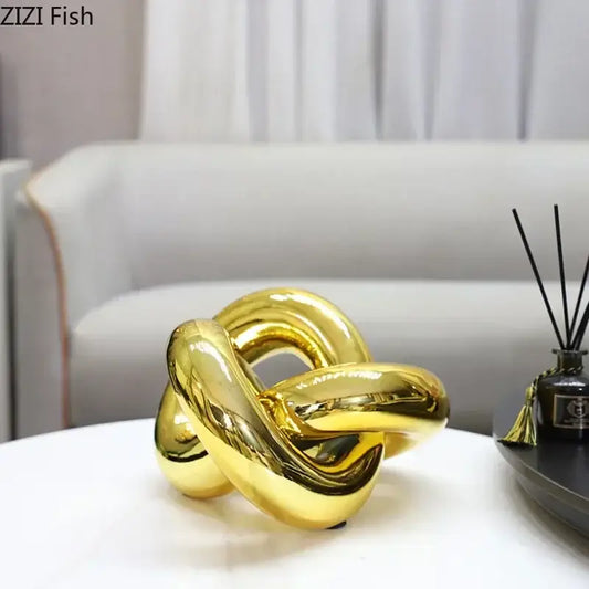 Shiny gold-plated knot ornaments decorbites geometric sculpture for modern living room decor