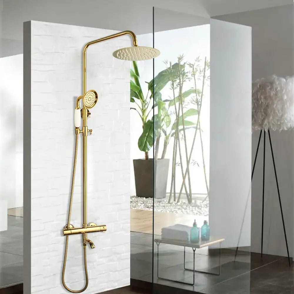 Modern gold plated thermostatic shower set with round rainhead and handheld nozzle on sleek wall bracket decorbites gold plated