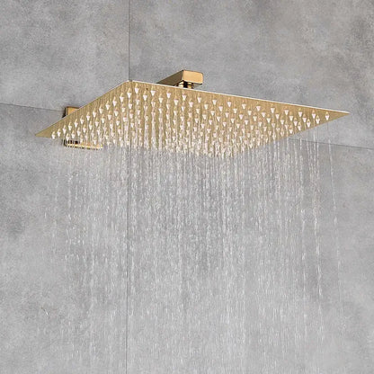 Gold rainfall shower head with square shape and multiple triangular massage jets spraying water for decorbites bathroom