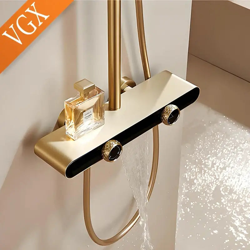 Modern gold rainfall shower set with hand shower and shower head featuring gold-toned finish black accents and textured knobs