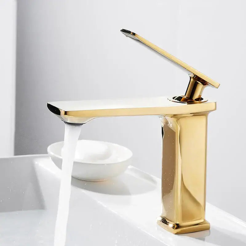 Modern gold rectangular brass basin faucet with sleek metallic finish and minimalist design for bathroom mixer tap