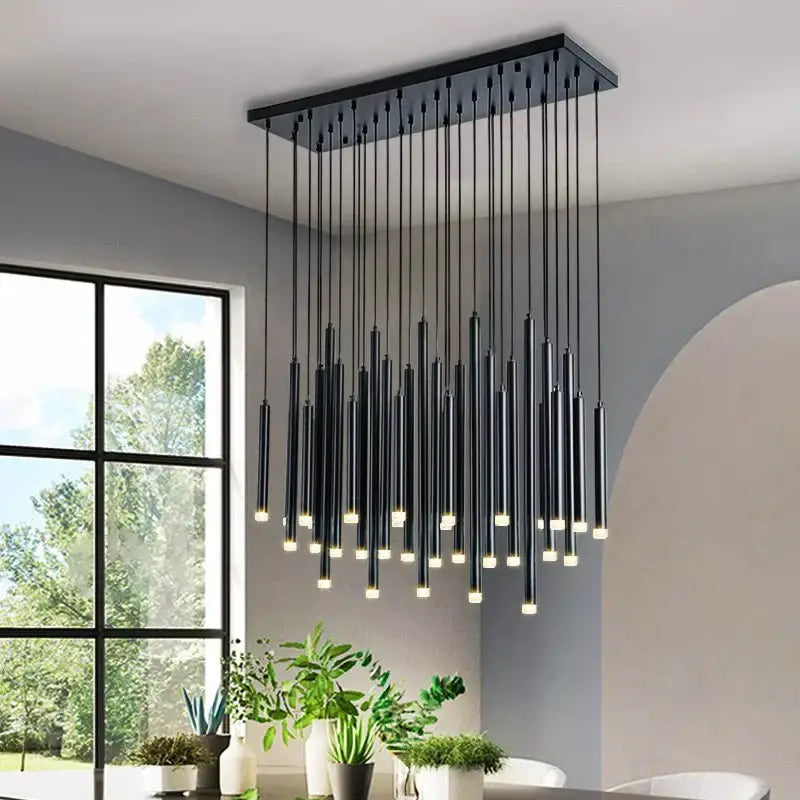 Modern gold rectangular chandelier with slender cylindrical rods and warm LED lights for dining room pendant lights decorbites elegant chandelier