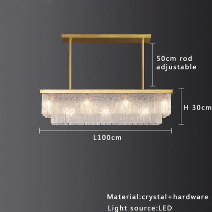 A modern gold rectangular decorbites crystal glass ceiling chandelier with cascading textured clear crystals for dining room decor