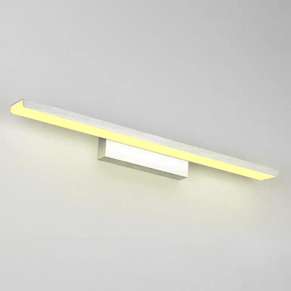 Modern minimalist vanity sconce with sleek silver metallic finish and warm yellow led illumination for bathroom use