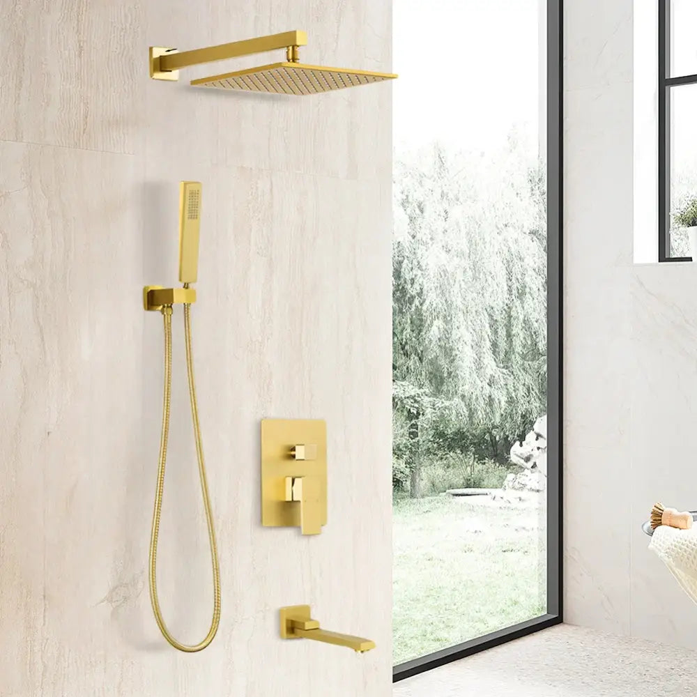 Modern gold-toned rectangular rainfall shower head with matching handheld shower and wall-mounted control valve set
