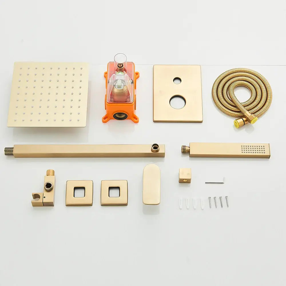 Modern gold rectangular rainfall shower system with square rainhead handheld sprayer and matching bathroom fixtures