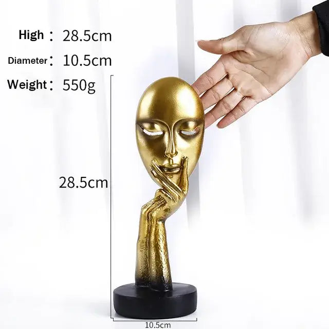Modern gold resin sculpture with golden metallic face and hand on lips on black base by decorbites gold resin decor