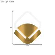 Modern gold rhombus led wall sconce with warm white direct wired electric power source and sleek angular design