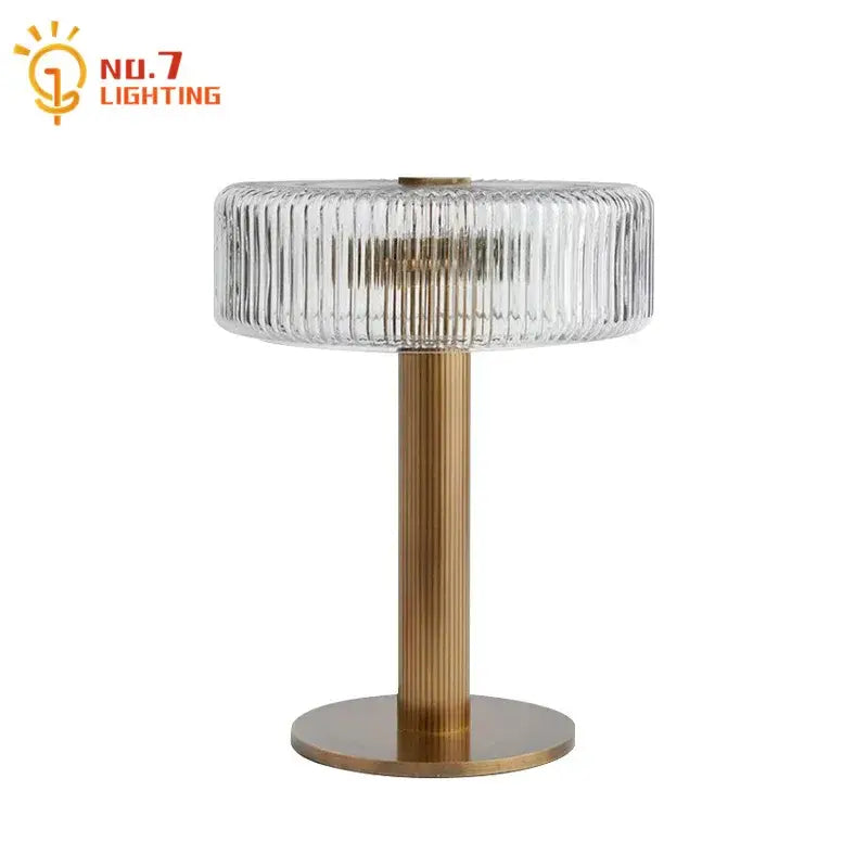 Modern gold ribbed glass table lamp with clear glass shade and brass base perfect for bedroom light fixtures decorbites glass table lamp