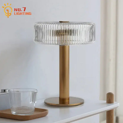 Modern gold ribbed glass table lamp with clear ribbed glass shade and brushed gold metal base for bedroom decorbites glass table lamp