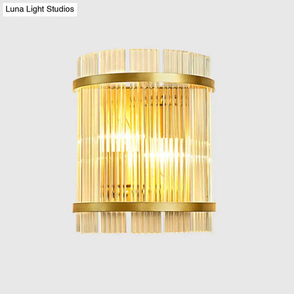 Modern gold ribbed glass wall mount light with vertical glass rods and brass bands for living room wall use