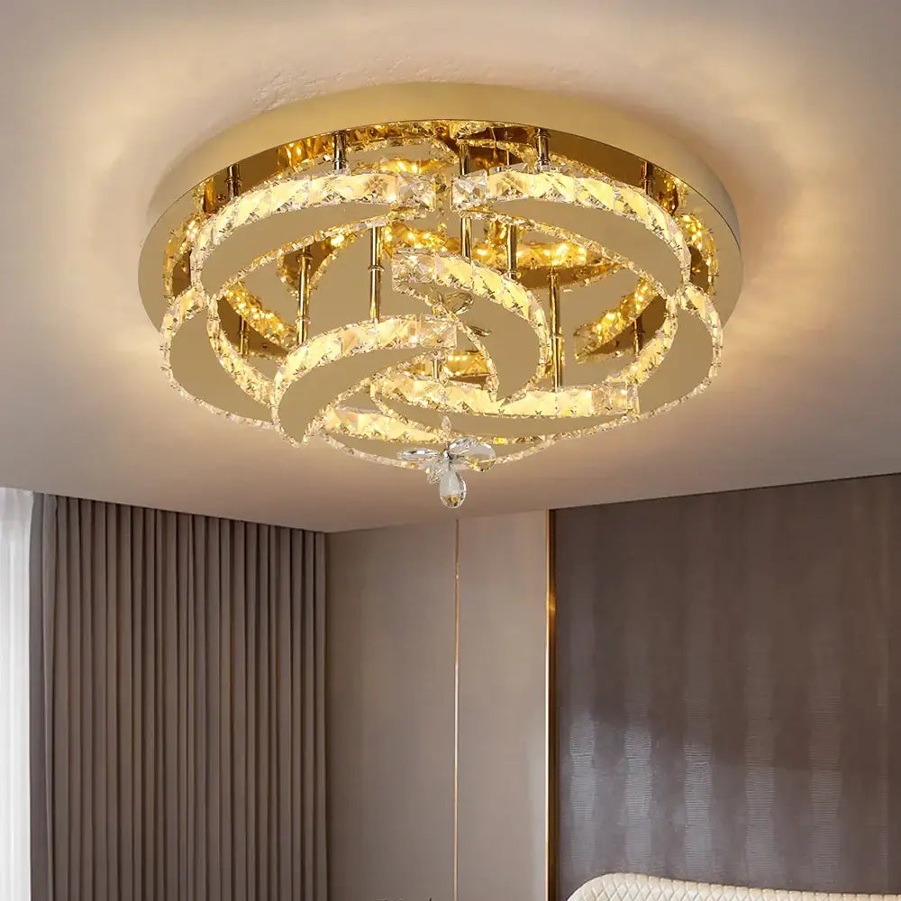 Modern gold ring crystal drop chandelier with concentric rings and central pendant for dining room decorbites crystal drop