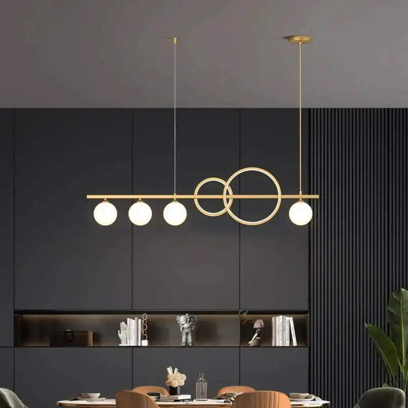 Modern gold ring elegant chandelier pendant light with four frosted glass bulbs and overlapping metal rings for dining room decorbites elegant chandelier