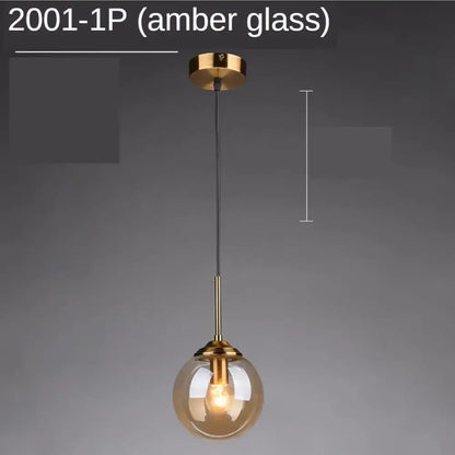 Modern gold ring glass globe pendant light with amber spherical glass globe and brass hardware for dining room