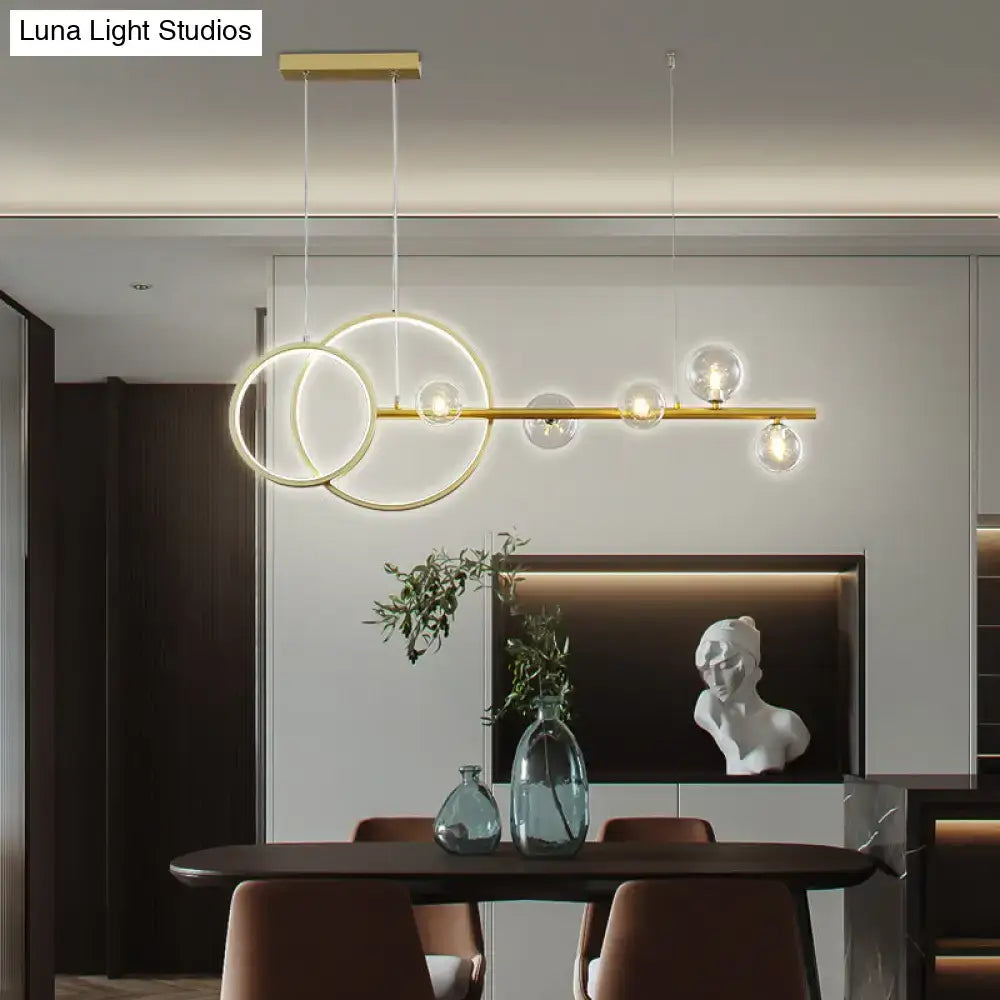 Modern gold-toned decorbites™ ring led pendant light with circular glass elements for dining room hanging island light