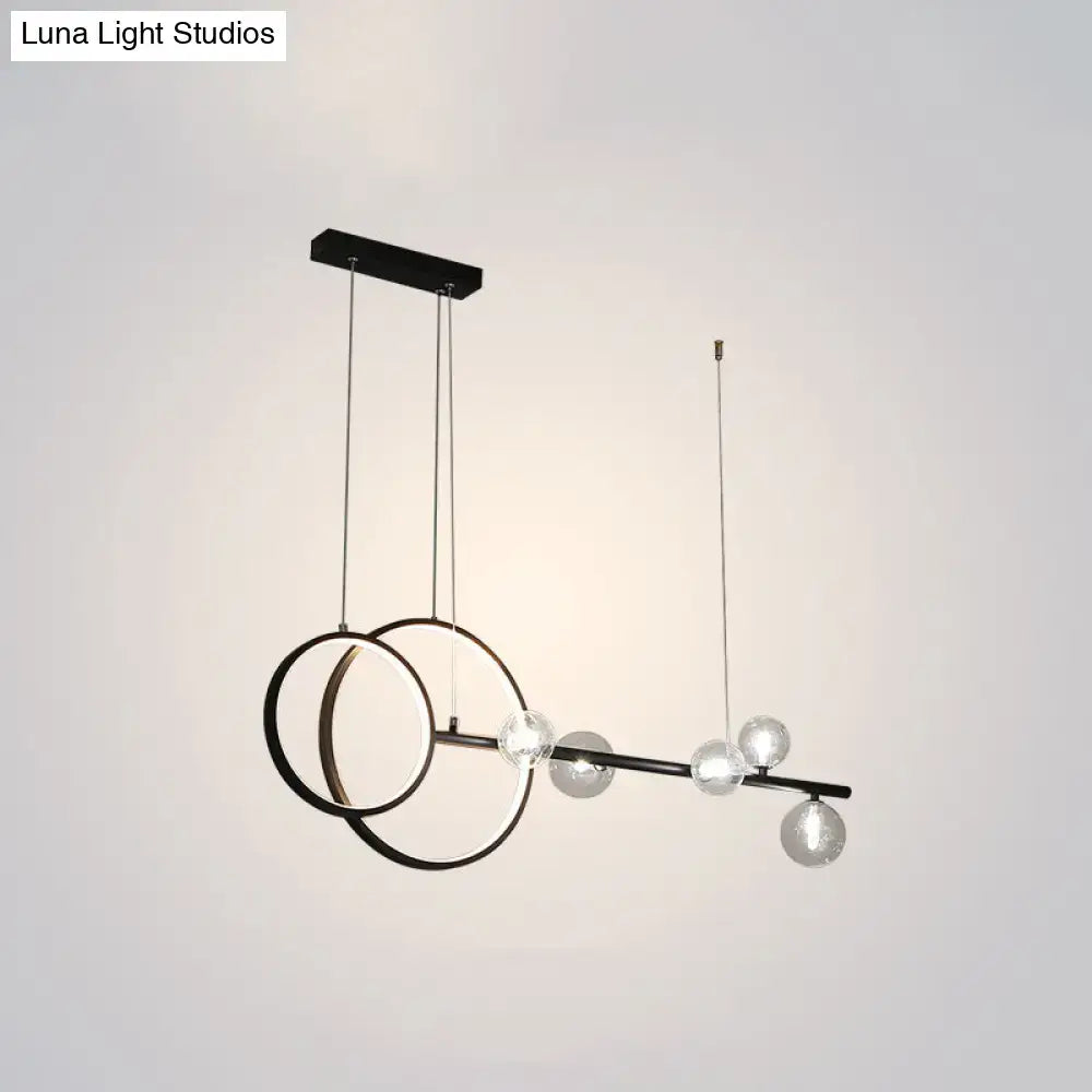 DecorBites™ modern black metal ring led pendant with intersecting circular rings and clear glass bulbs for dining room