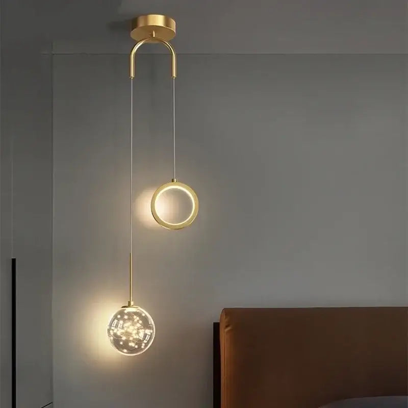 Modern gold ring led pendant light with sleek circular fixture and crystal globe for living room decorbites gold ring decor
