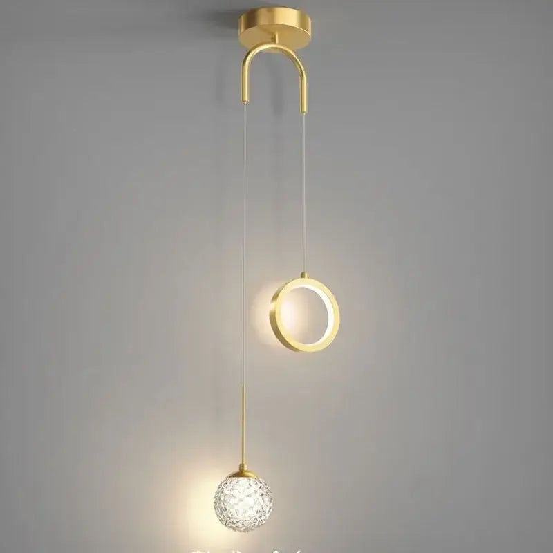 Modern gold ring led pendant light with sleek curved ceiling mount and faceted crystal globe for living room decorbites gold ring